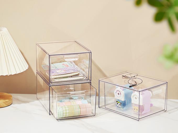 Des tiroirs pour organiser le maquillage empilés, un tiroir de rangement acrylique de salle de bains de 4,4 pieds de haut, une boîte de rangement de cosmétiques pour vanité 0