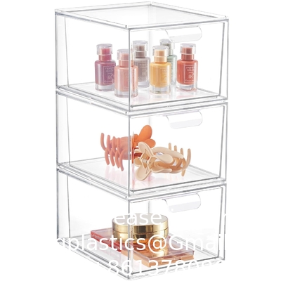 Des tiroirs pour organiser le maquillage empilés, un tiroir de rangement acrylique de salle de bains de 4,4 pieds de haut, une boîte de rangement de cosmétiques pour vanité